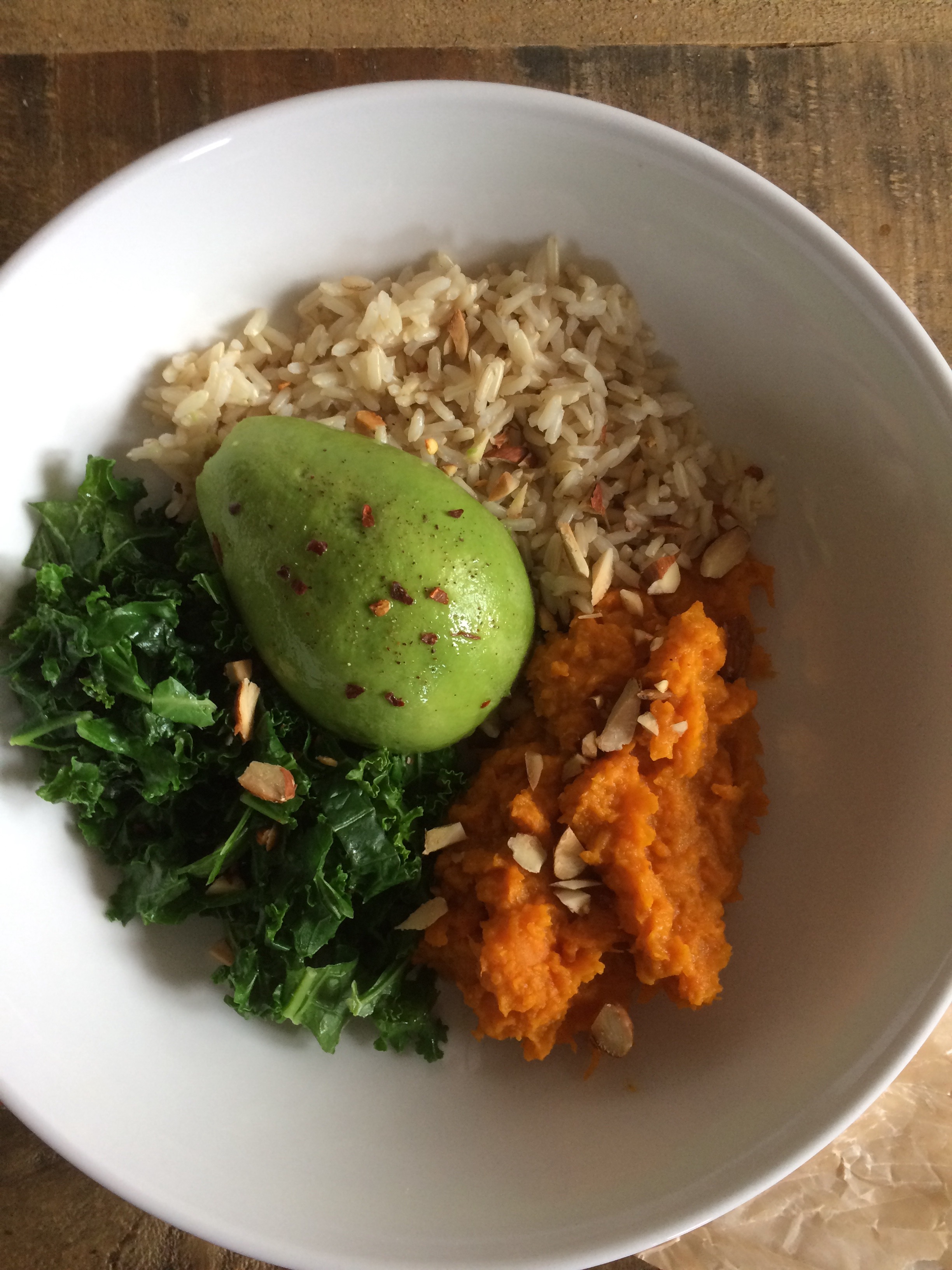 Vegan Bowl with Turmeric Sweet Potato, Kale, and Avocado